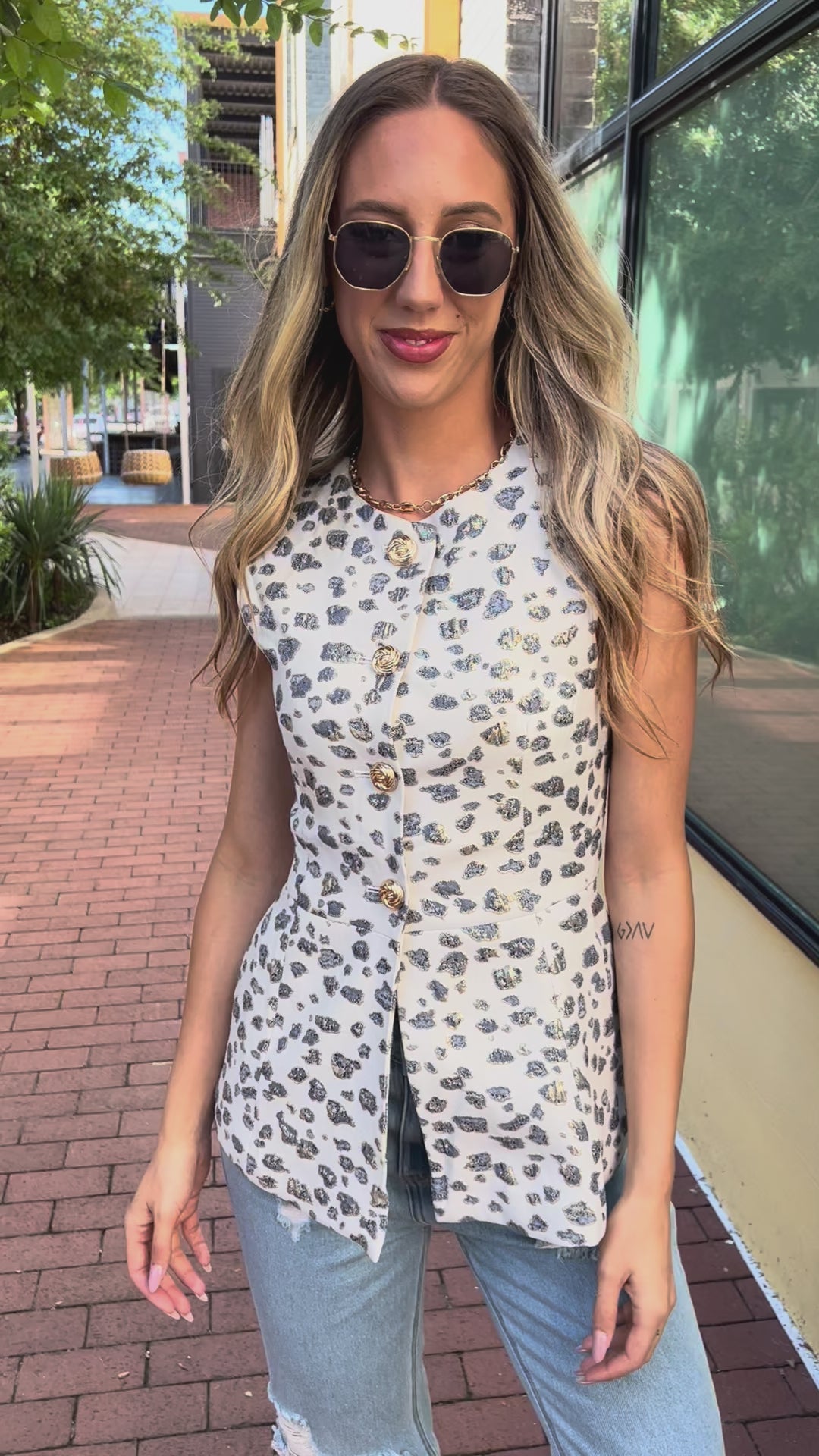 Silvermist Leopard Vest on a blond model with sunglasses in an outdoor setting | Southern House Clothing