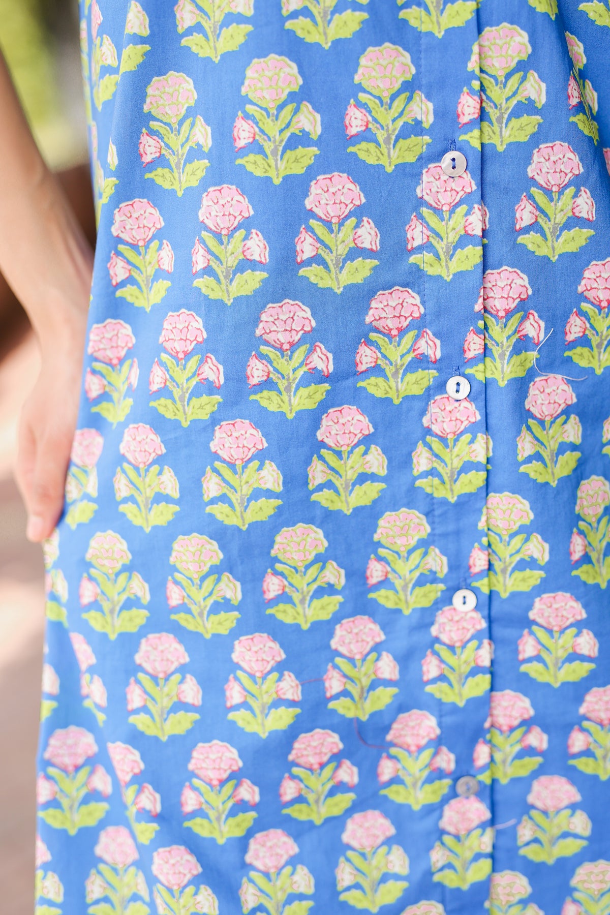 Blue fabric with pink floral pattern