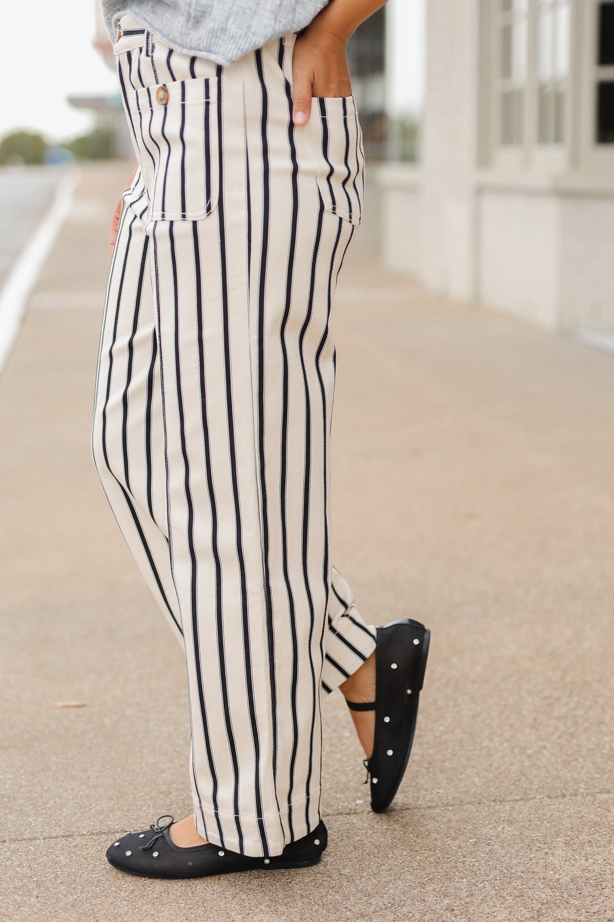 Close up black and white striped pants . Southern House Clothing
