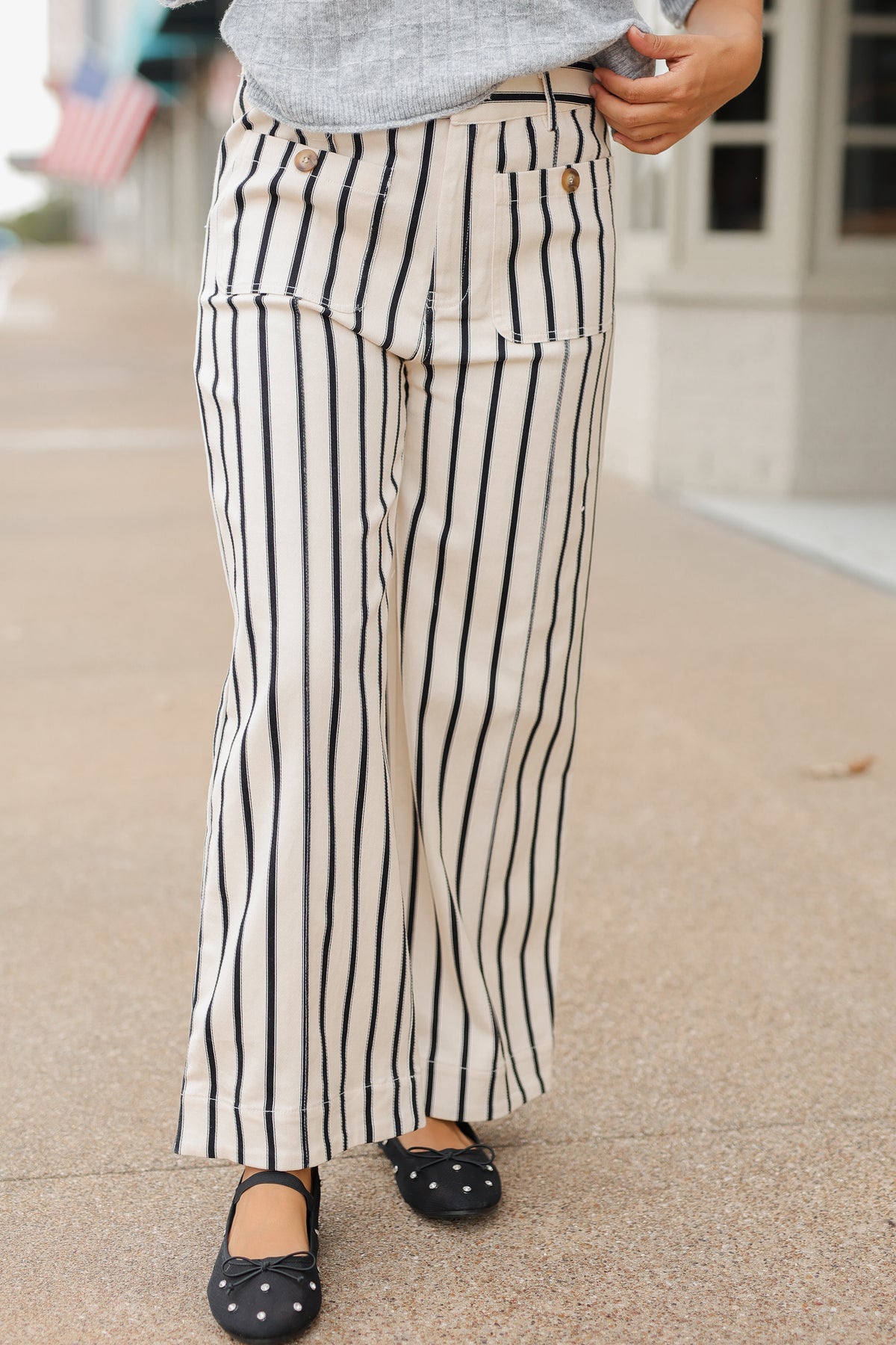Close up black and white striped pants . Southern House Clothing
