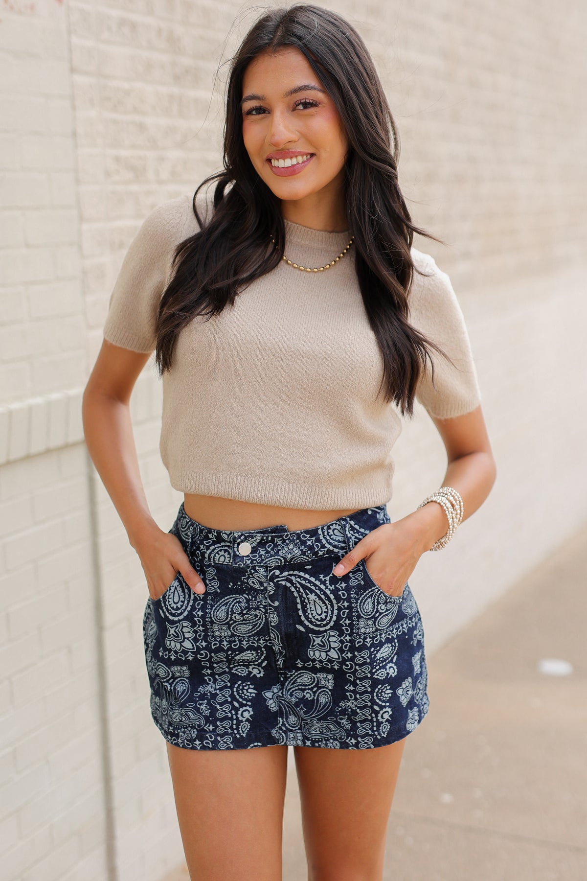 Lantana Knit Sweater Top in oatmeal styled with high-waisted Bandera Paisley Denim Shorts featuring a western-inspired bandana pattern. Southern House Clothing