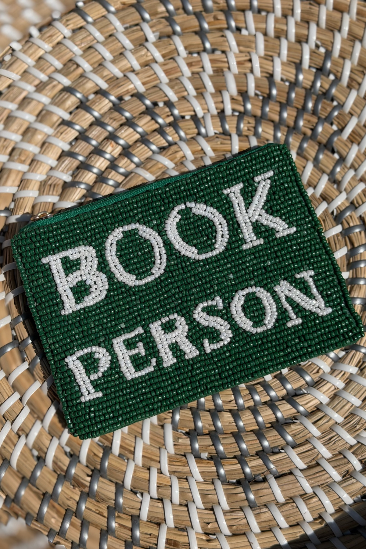 Patch with 'BOOK PERSON' text on a woven background